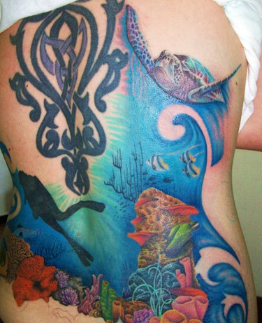 Nice colored massive underwater life tattoo on back