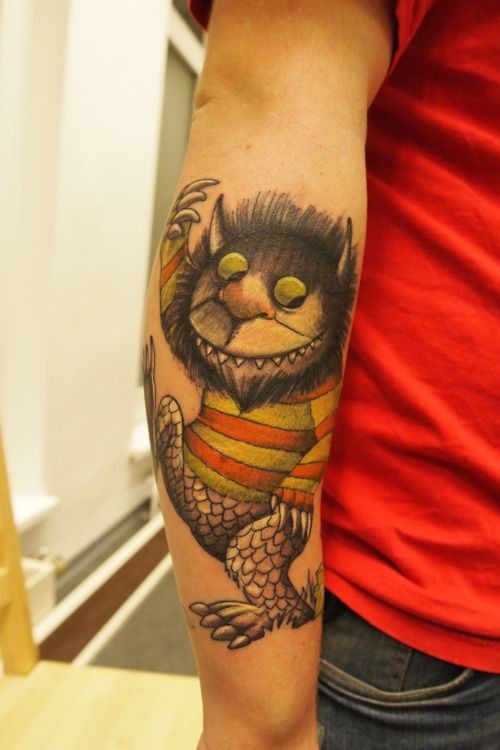 Nice colorful big forearm tattoo of fantasy funny monster