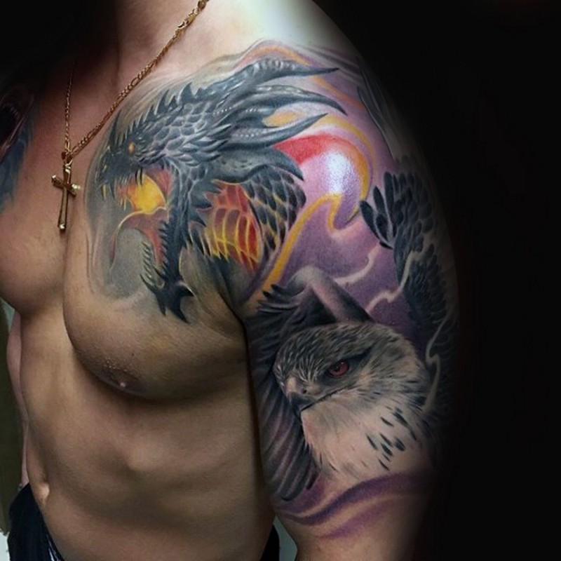 Nice detailed colored fantasy dragon tattoo on shoulder with eagle