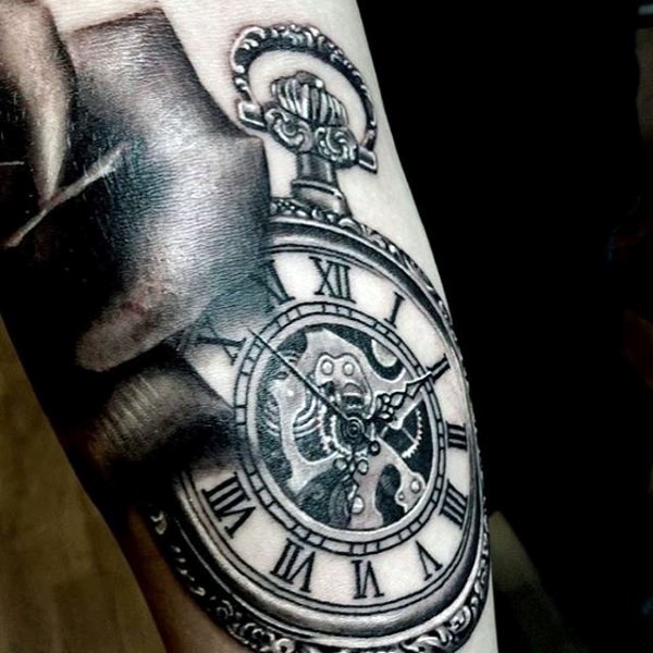 Nice looking black and white antic mechanic clock tattoo on arm