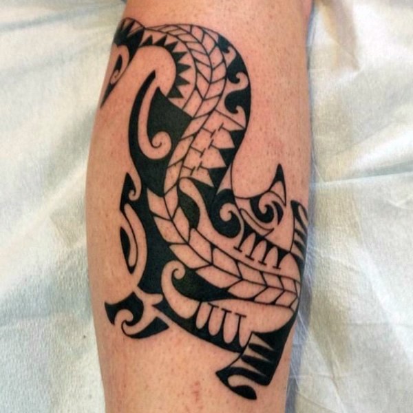 Nice looking black ink leg tattoo of Polynesian style hammerhead shark