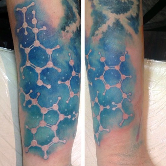 Nice looking colored forearm tattoo of chemistry