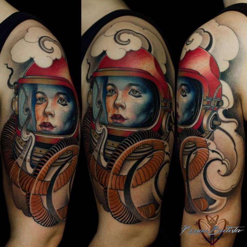 Nice looking colored shoulder tattoo of woman astronaut