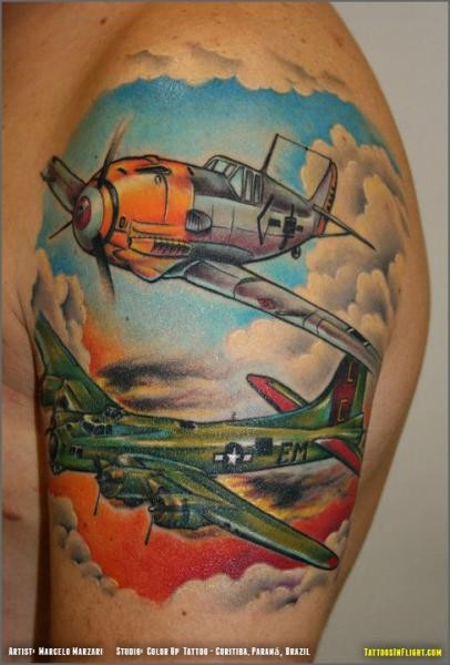 Nice looking colored shoulder tattoo of WW2 planes