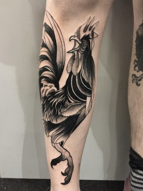 Nice looking detailed by Michele Zingales leg tattoo of big cock