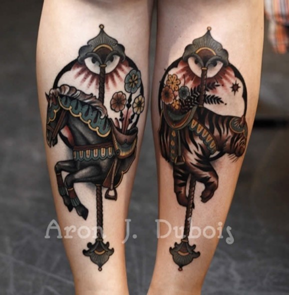 Nice looking illustrative style arm tattoo of various animals
