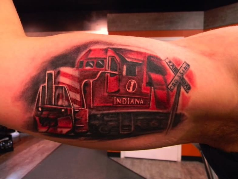 Nice looking red colored biceps tattoo of modern cargo locomotive train