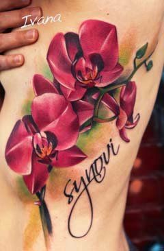 Nice maroon orchids tattoo on ribs by Ivana