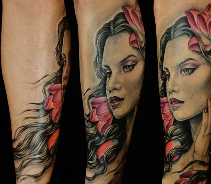 Nice painted and colored arm tattoo of woman portrait with flowers