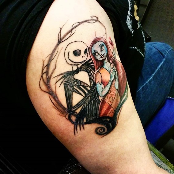 Nice painted colorful Nightmare before Christmas romantic couple tattoo on upper arm zone
