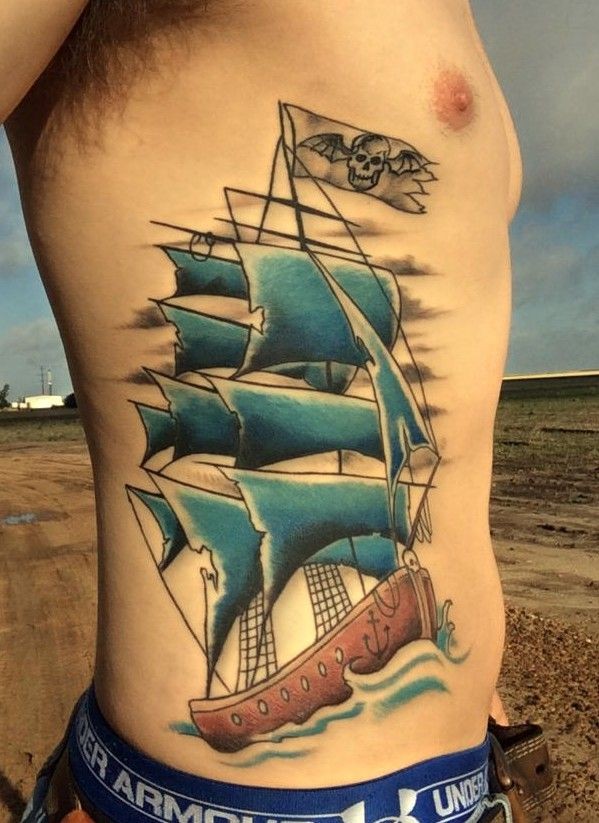 Nice pirates ship tattoo  on ribs