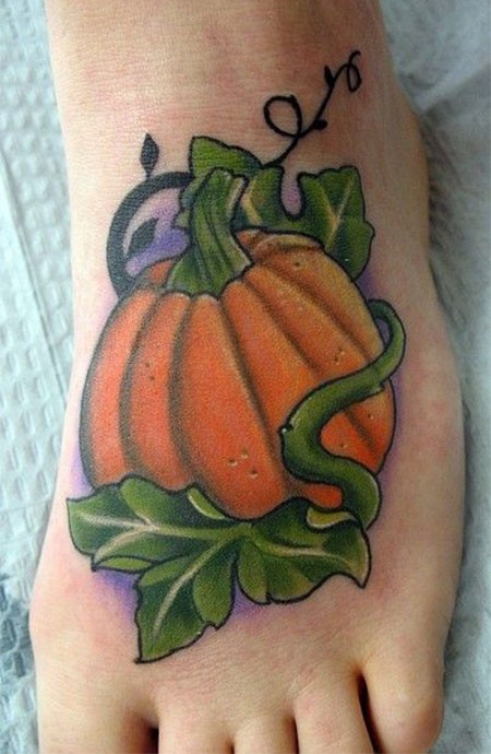 Nice plum naturally colored pumpkin foot tattoo