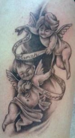 Nice two hovering cherubs tattoo