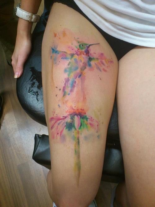 Nice watercolor bird tattoo on thigh