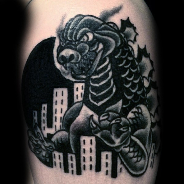 Schwarzer Godzilla mit Stadt wie aus alten Cartoons Tattoo auf Bein
