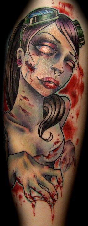 Old cartoon like colored zombie woman tattoo on shoulder zone