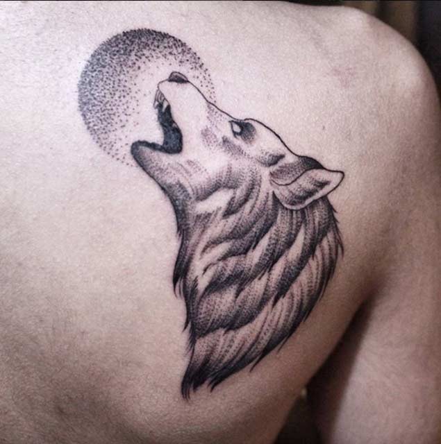 Old cartoons style black ink shoulder tattoo of wolf with moon
