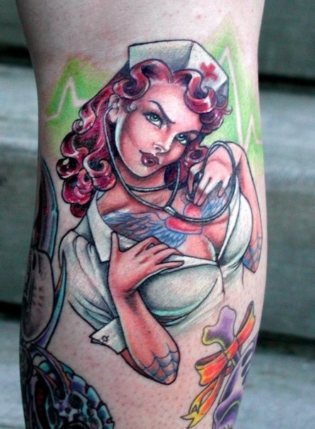 Old cartoons style multicolored sexy nurse tattoo on leg