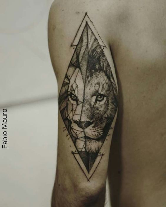 Old looking dot style upper arm tattoo of lion portrait