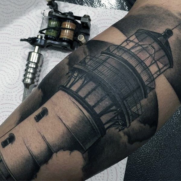 Old realistic black ink lighthouse tattoo on arm