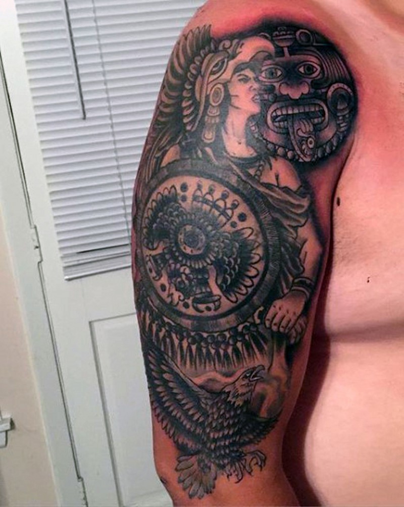 Old school black and white shoulder tattoo of tribal warrior with shield and eagle