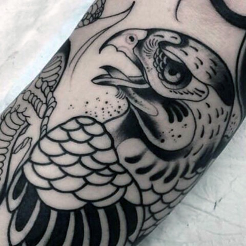 Old school black ink forearm tattoo of sweet looking eagle