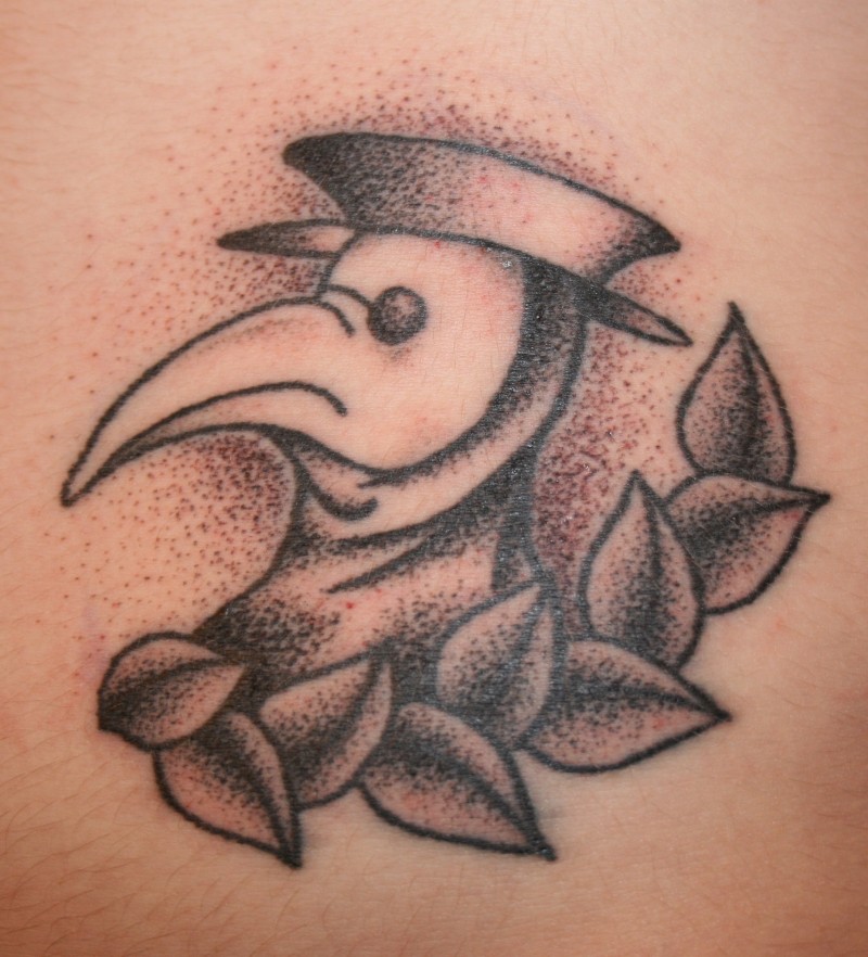 Old school black ink gentleman like bird tattoo combined with leaves