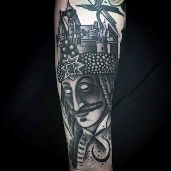 Old school black ink mysterious man with castle shaped hat tattoo on arm