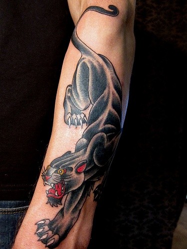 Old school black panther forearm tattoo