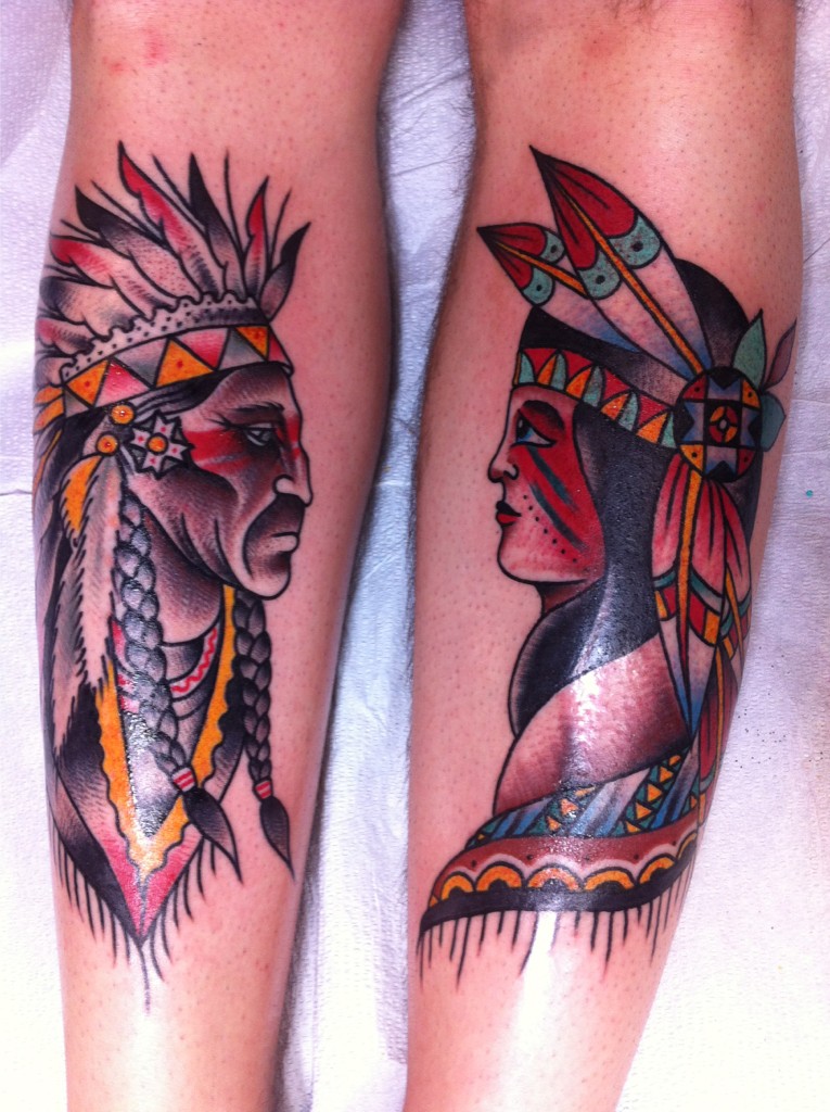 Old school colored big Indian couple tattoo on legs