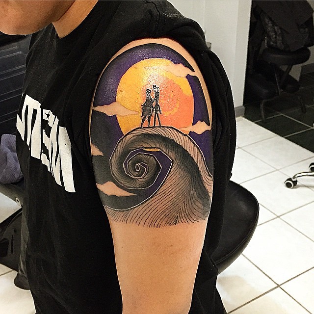 Old school colored shoulder tattoo of couple with moon