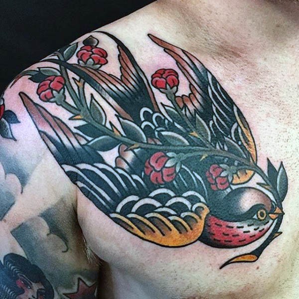 Oldschool buntes Vogel Tattoo mit Blumen an der Brust