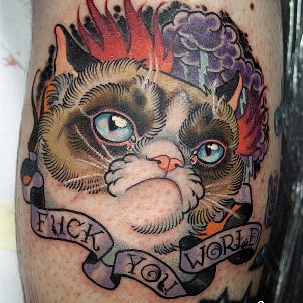 Old school cool looking cat tattoo on arm with lettering, flames and lightning