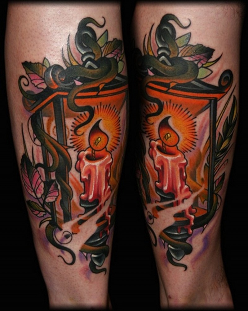 Old school designed and colored forearm tattoo of old candle street lighter with leaves