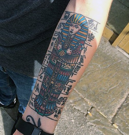 Old school forearm tattoo of antic Egypt wall painting
