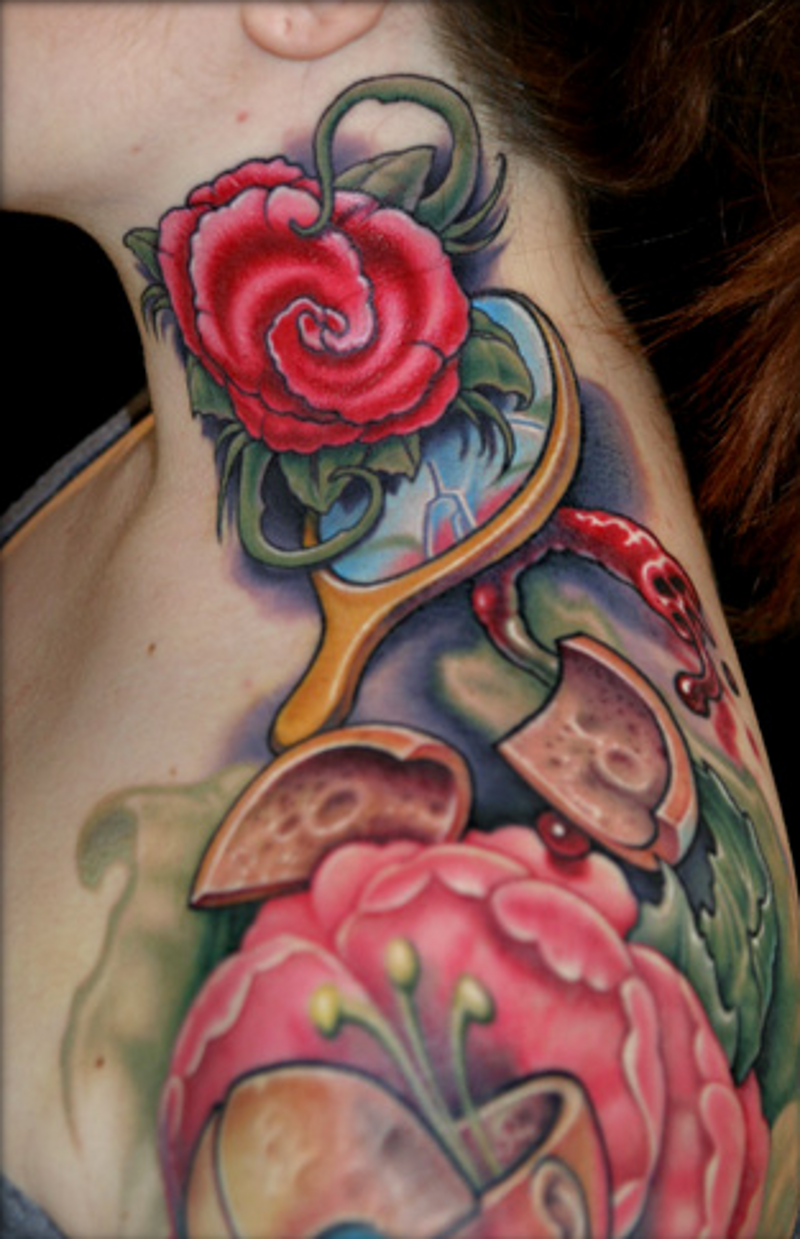 Old school multicolored shoulder and neck tattoo of various flowers and mirror