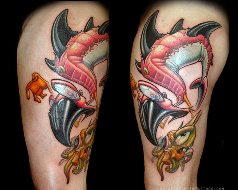 Old school multicolored thigh tattoo of funny fishes