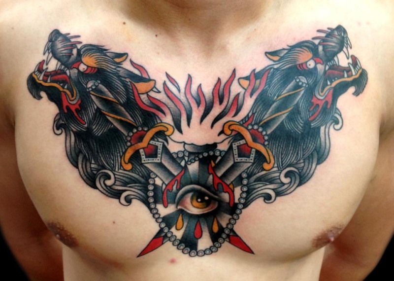 Old school painted and colored hell dogs tattoo on chest combined with crossed swords and bloody eye