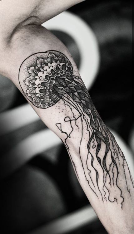 Old school style black and white detailed big jelly-fish tattoo on arm