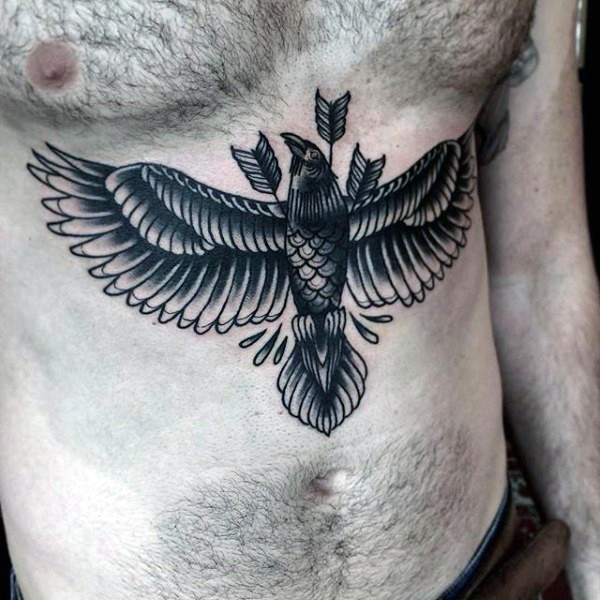 Old school style black crow wounded with bunch of arrows detailed upper belly tattoo