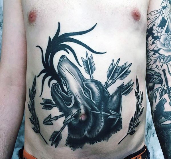 Old school style black ink belly tattoo of wolf head with arrows