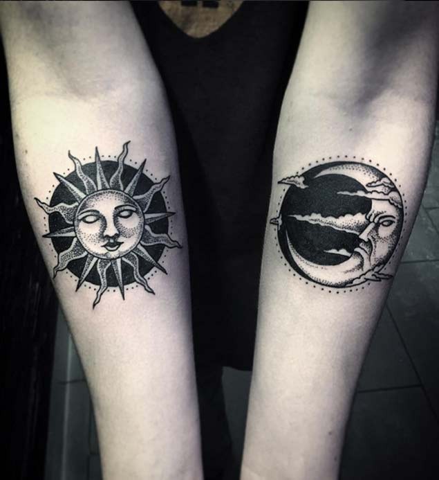 Old school style black ink forearm tattoo of sun and moon