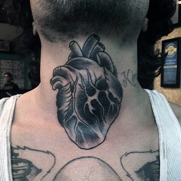 Old school style black ink human heart tattoo on neck