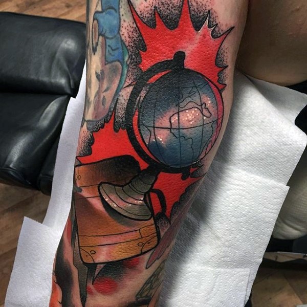 Old school style colored arm tattoo of little globe with book