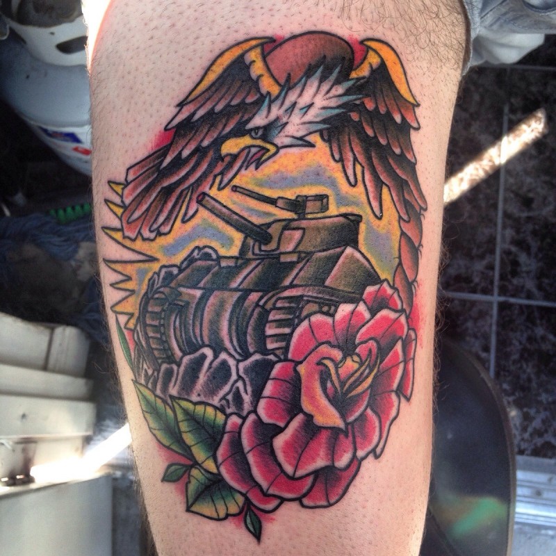 Old school style colored arm tattoo of Sherman tank with rose and eagle