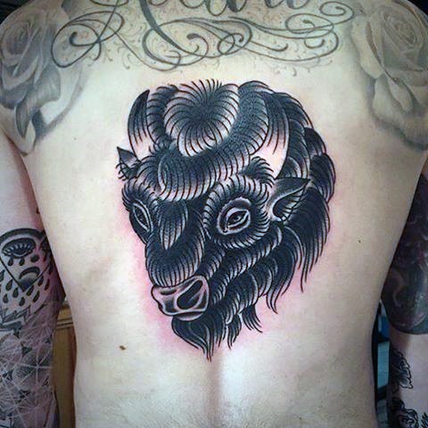 Old school style colored back tattoo of grunting ox head