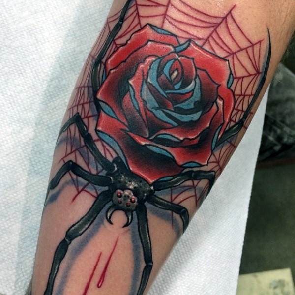 Old school style colored bloody spider tattoo on leg with rose