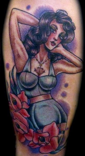 Old school style colored brunette seductive pin up girl and red roses tattoo with violet haze
