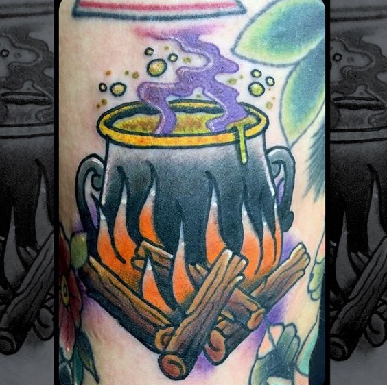 Old school style colored burning vat tattoo