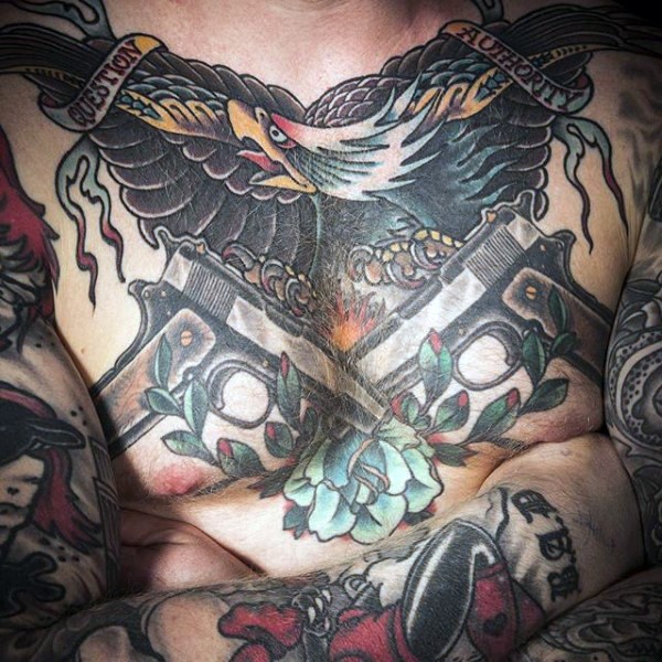 Old school style colored chest tattoo of crossed pistols with eagle and flowers